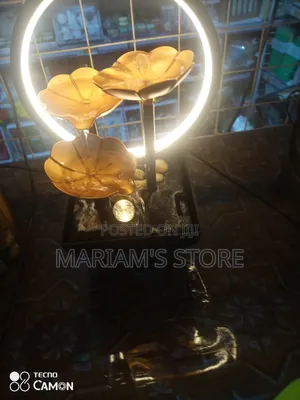 Flower Indoor Tabletop Fountain With an Integrated Led Ring Light.