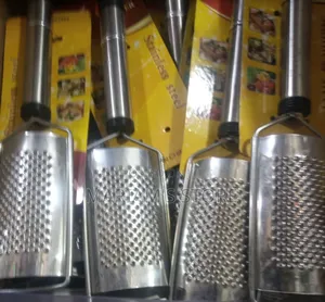 Handheld Stainless Steel Graters Used for Cheese, Vegetables,
