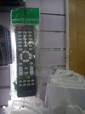 Black Universal Led Tv Remote Control Packaged in a Plastic Bag.