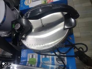 Stainless Steel Electric Roti Maker. [1]