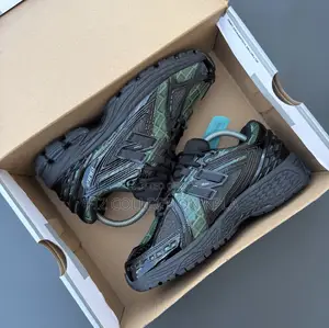 New Balance 1906 Shiny Green Black – “Venom Glow”