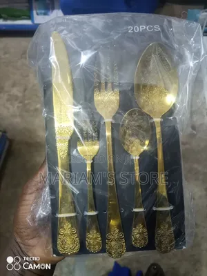 20pcs Gold Stainless Steel Flatware Set With a Decorative Pattern.