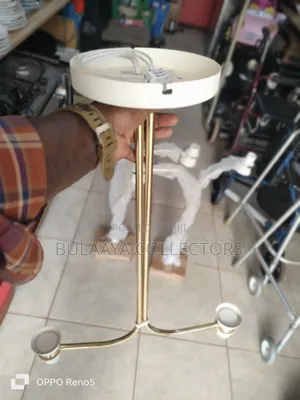 Uk Modern Brass-Plated Ceiling Light Fixture With a Two-Arm Design.