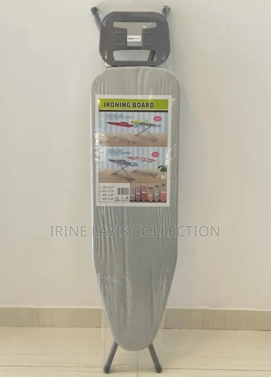 Big Foldable Ironing Board With a Metallic Frame and Iron