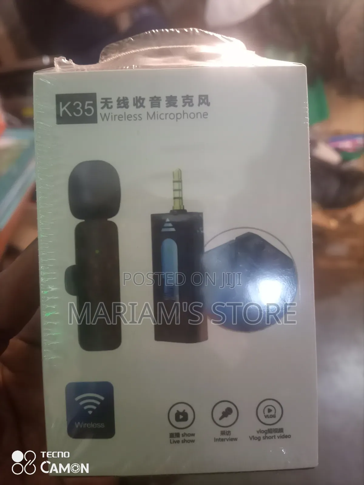 Wireless Lavalier Microphone System for Cameras and Smartphones.