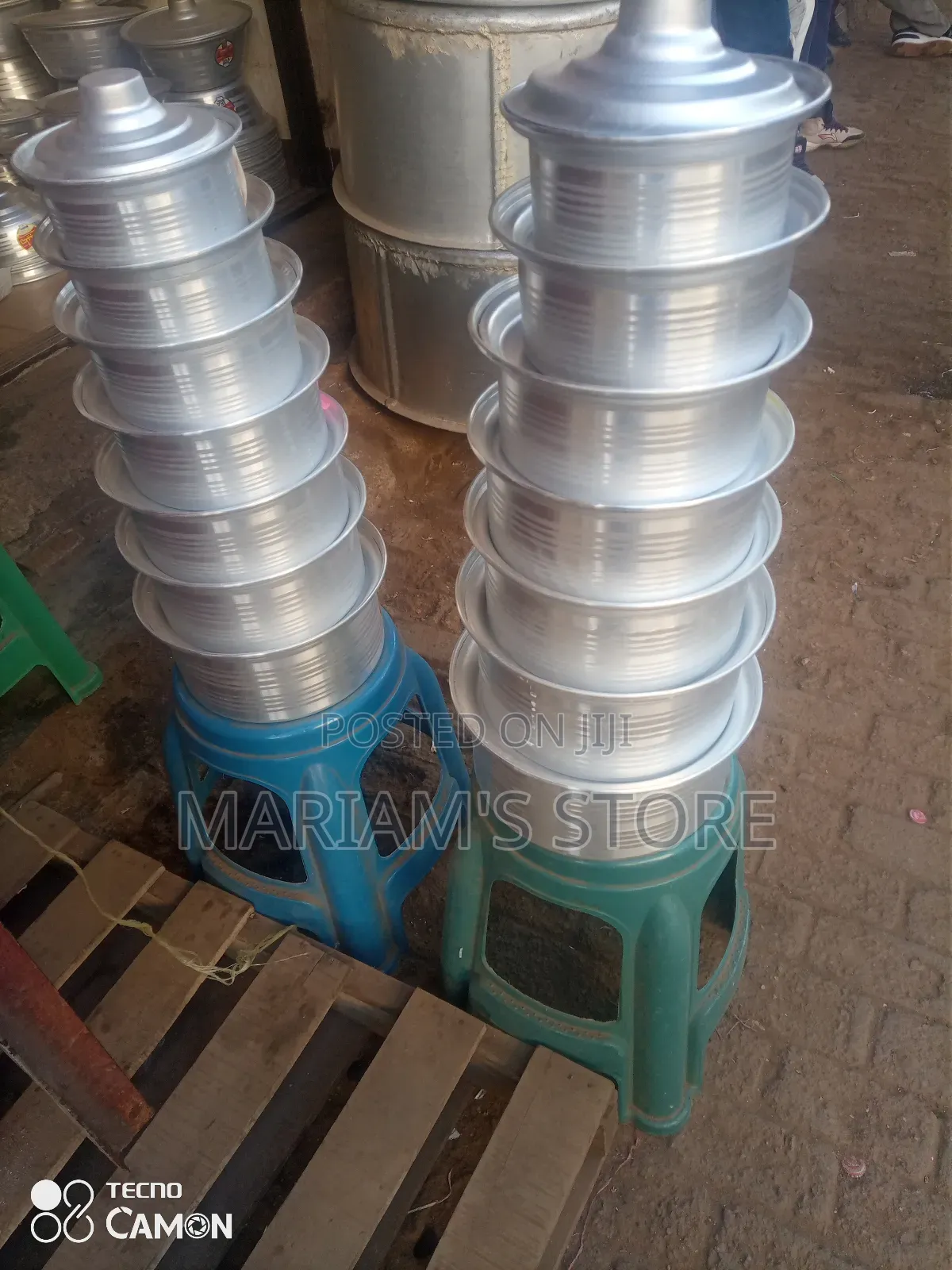 Aluminium Sudanese Saucepans Often Sold in Sets With Lids.]