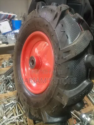 Agricultural Pneumatic Rubber Wheel With a Herringbone Tread Pattern.