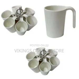 Tea Cups on a Round Wooden Stand