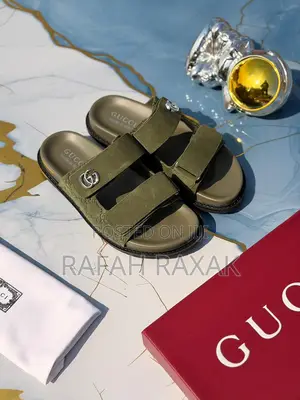 Embossed Double Strap Gucci Men’S Gg Slide Sandals