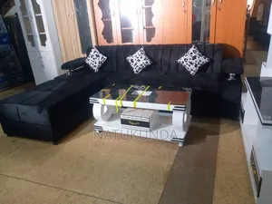L Shaped Black Sofa With Pillows