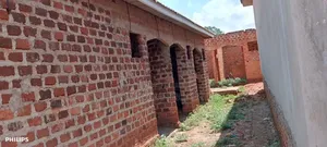 Three Semi Finished Rentals With Shop Forcedsale Heart of Nansana Town