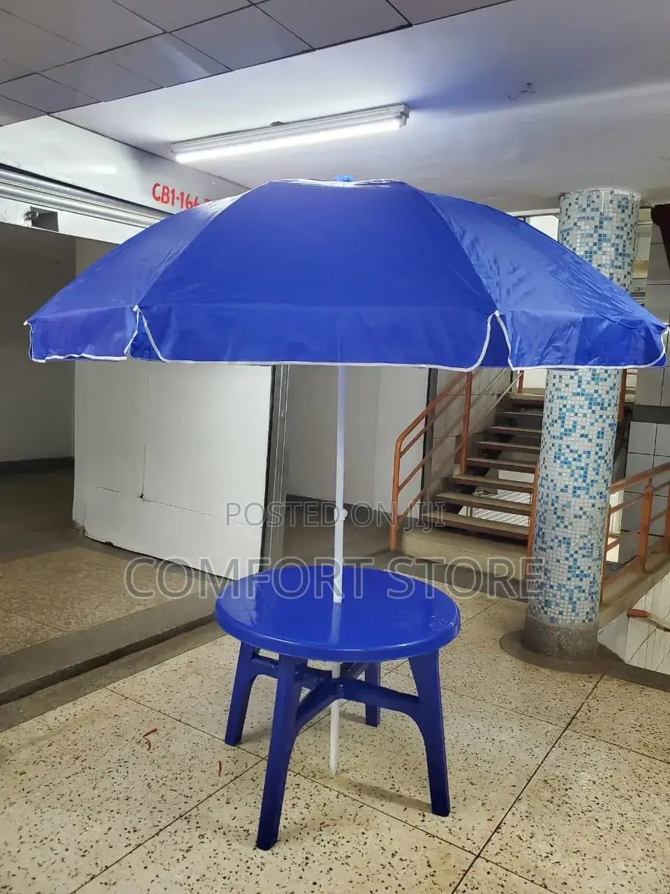 Beach Umbrella in Blue With a Durable Table