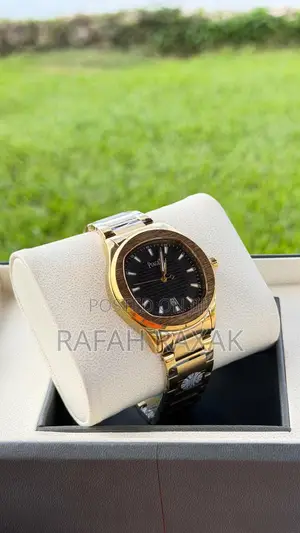 Black Dial and Gold Strap Piaget Timepiece