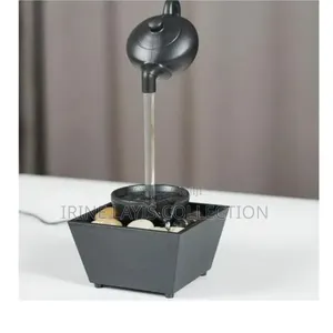 Floating Teapot Tabletop Water Fountain With Led Lighting.