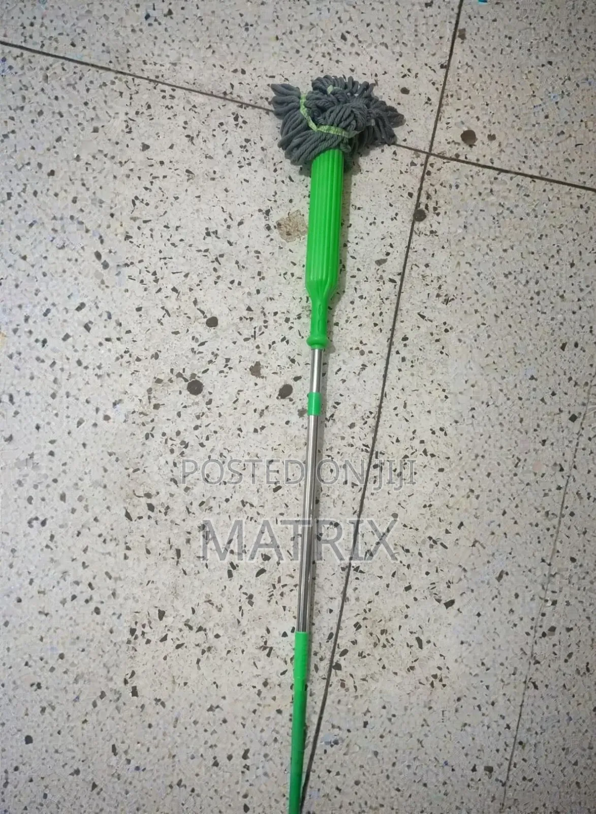 2-in-1 Self-Wringing Twist Mop With a Telescopic Handle.