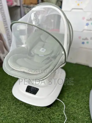 Deluxe Multi Motion Baby Swing – Infant Peaceful Motion Cradle