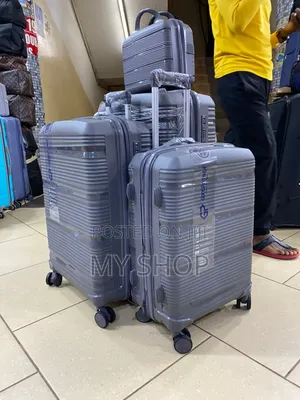 Lightweight Plastic Suitcase Set of 4 - Durable Travel Companion