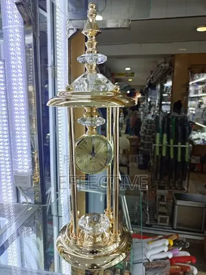 Decorative Gold-Toned Metal and Crystal Table Clock Centerpiece.