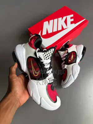 Nike Air Max Alpha Savage 2 Sneakers White, University Red, and Gold.