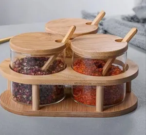3-Piece Rotating Condiment Set With Clear Jars and Wooden Accessories