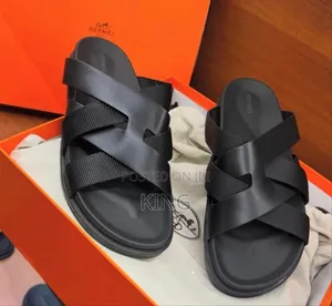 Hermès Kazimir Sandals in Noir Black, Brown