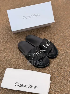 Calvin Klein Jeans Triple Black Slides.