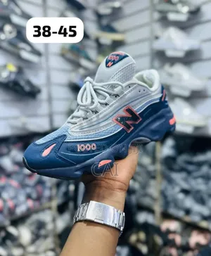 New Balance 1000 Sneakers in the Navy and Nautical Coral