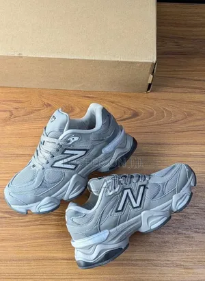 New Balance 9060 Sneakers in a Predominantly Grey Colorway