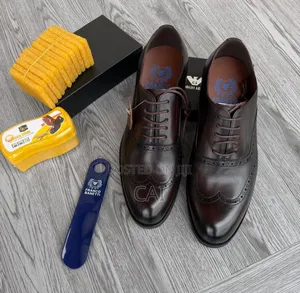 Franco Banetti Classic Wingtip Oxford Dress Shoes in Dark Brown.