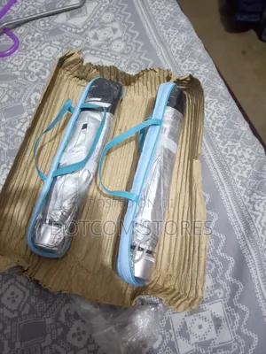 Portable, Foldable Sun And Rain Umbrella.