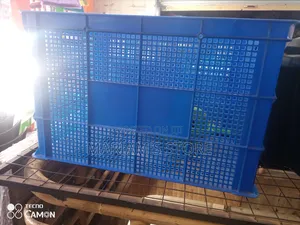 Ventilated Blue Plastic Crate Commonly Used for Storage and Transport