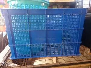 Ventilated Blue Plastic Crate Commonly Used for Storage and Transport