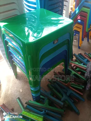 Stack of Durable Plastic Tables Multi Colours