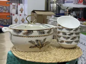 Elegant Gold Palm Leaf Ceramic Serving Set.