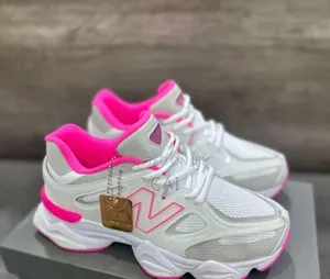 New Balance 9060 Sneakers. Hot Pink White