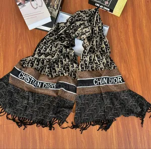 Christian Dior Oblique Scarf in Black and Beige.