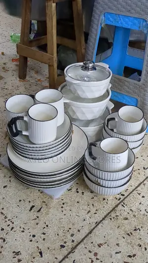 A Set of Kitchen Utensils Dishes, Bowls,Cups,Dinnerplates