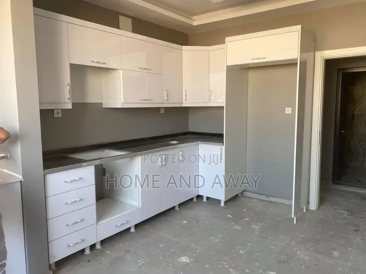 White L Shaped Kitchen Cabinets From 915,000/- Per Running Meter