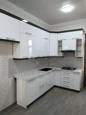 White L Shaped Kitchen Cabinets From 915,000/- Per Running Meter