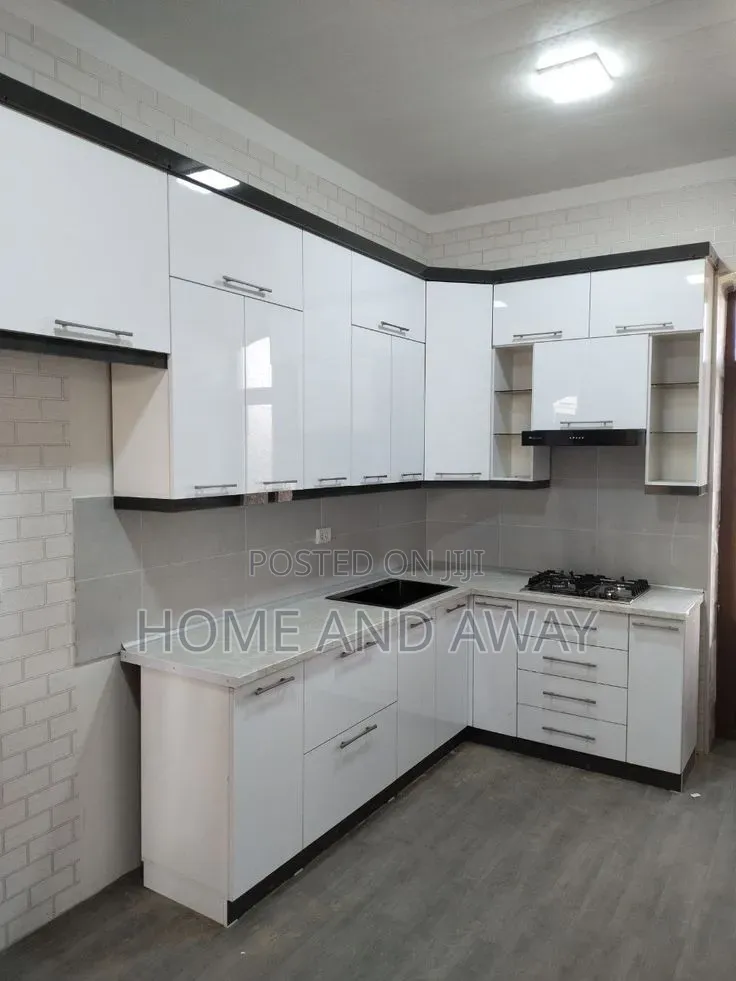 White L Shaped Kitchen Cabinets From 915,000/- Per Running Meter
