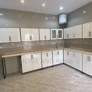 White L Shaped Kitchen Cabinets From 915,000/- Per Running Meter