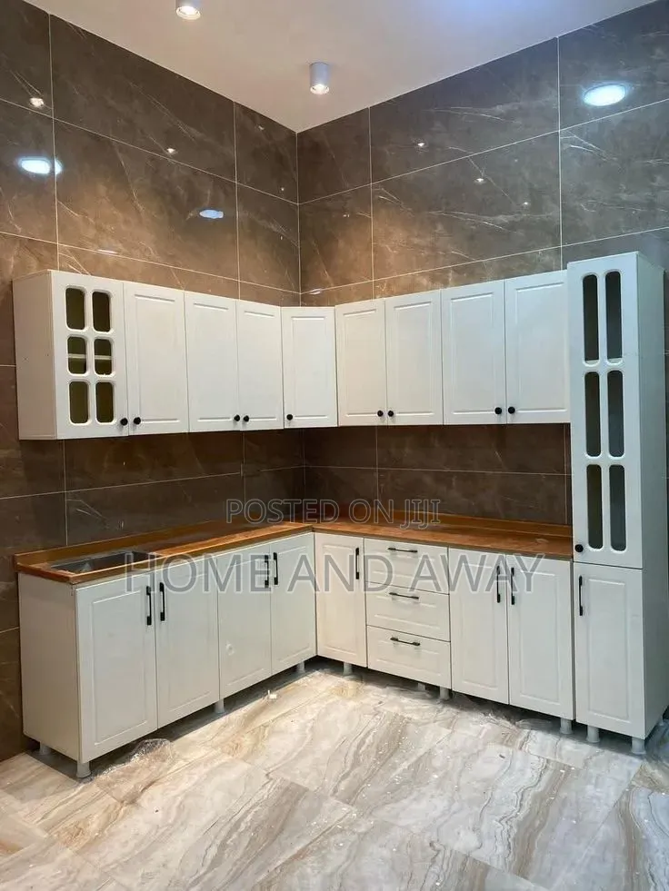 White L Shaped Kitchen Cabinets From 915,000/- Per Running Meter