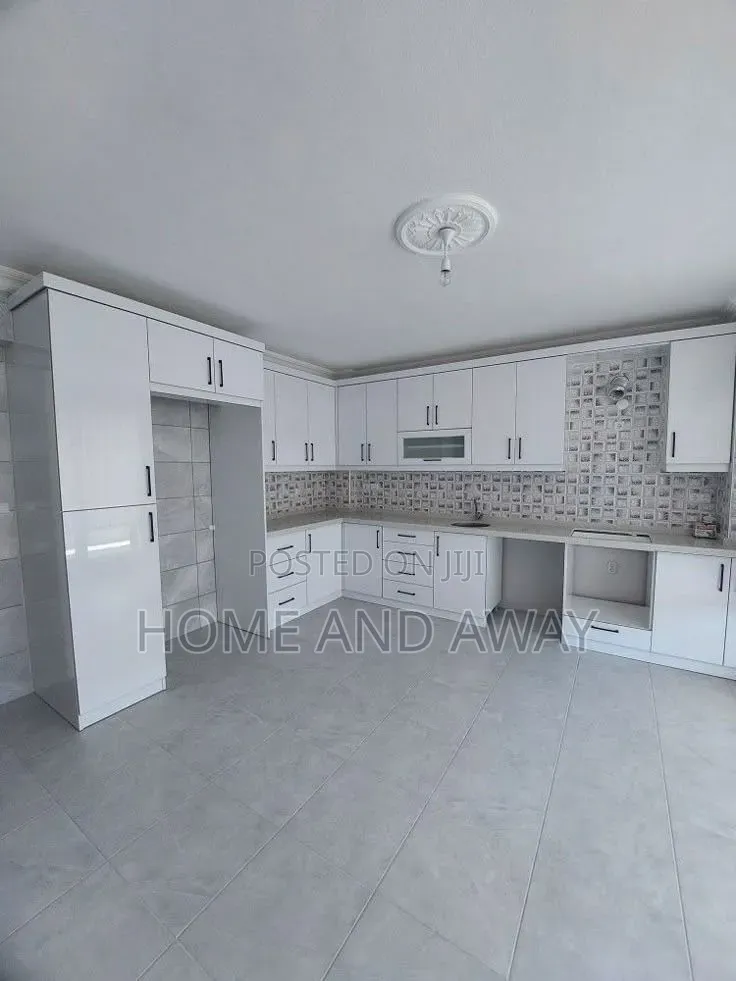White L Shaped Kitchen Cabinets From 915,000/- Per Running Meter