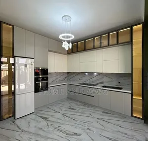 Perfect L Shaped Modern Elegant Kitchen Cabinets 890,000/- Per Meter