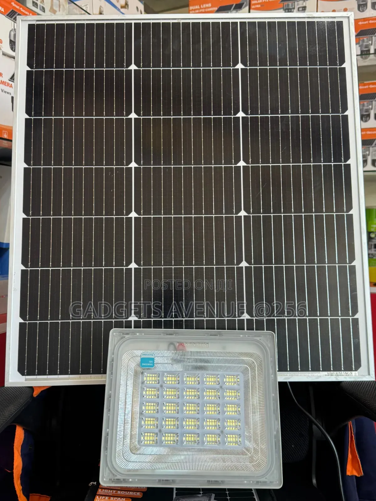 Blue Carbon Wawa Series Solar Flood Light With a Mono Solar Panel.