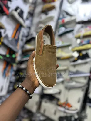 This Is a Timberland Men's Casual Brown Leather With a White Sole