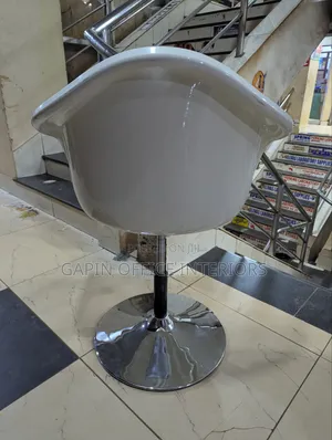 Salon Chair With A Big Base Plate And Adjustable Height