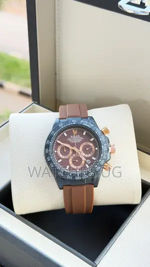 Brown Rolex Oyster Perpetual Watch