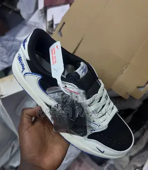White ,Black,And Blue Nike Air Jordan 1 Low Sneakers