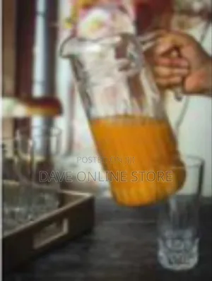 Elegant Clear Glass Pitcher and Tumbler Set